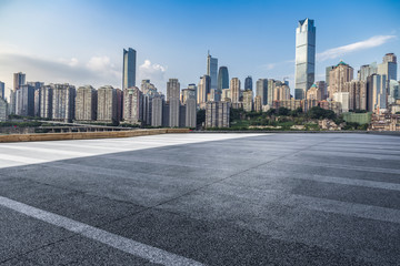 Fototapeta na wymiar Panoramic skyline and buildings with empty road，chongqing city，china