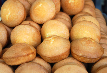 close up on fresh baked cakes in pile