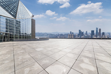 Panoramic skyline and buildings with empty concrete square floor，chongqing city，china