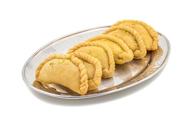 Gujiya or Gujia is a indian sweet dumpling made with suji, Maida or wheat flour and stuffed with khoya. It is common in North India, particularly in Bihar, Uttar Pradesh, Madhya Pradesh or Rajasthan