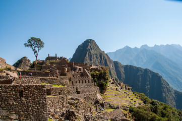 Fototapeta na wymiar View of the amazing Machu Picchu, the lost Incan city, Wayna Picchu and mountains. Machu Picchu is One of the New Seven Wonders of the world. Peru