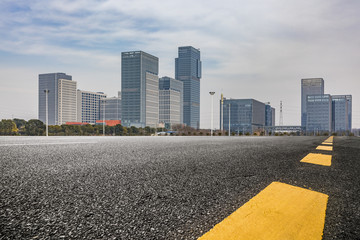 Empty Road with modern business office building 