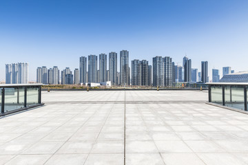 Fototapeta na wymiar Panoramic skyline and buildings with empty concrete square floor，chongqing city，china