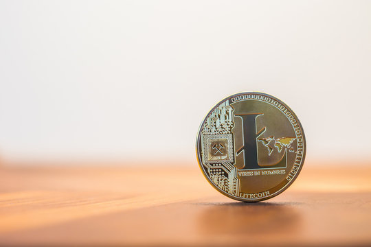Cryptocurrency Litecoin digital money sign, white background.