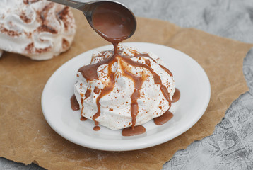 Cheese Cake with Caramel Sauce Isolated Caramel Sauce over Brown Paper with Spoon Sweet Sugar Dessert