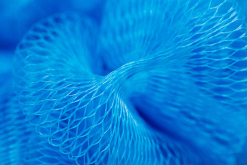 Blue synthetic sponge as an abstract background