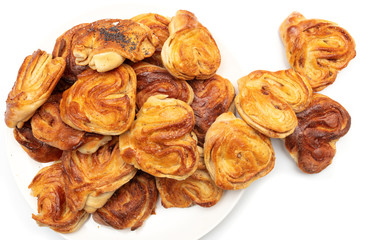 Buns with raisins and jam on a white background