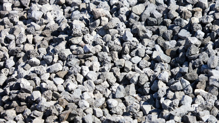 Stone crushed stone on the construction site as an abstract background