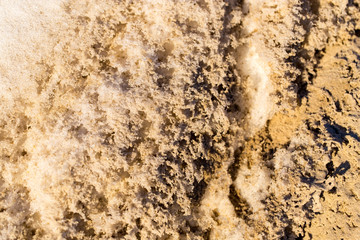Snow with sand as an abstract background