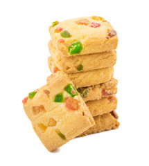 Stacked Delicious Tutti Frutti Cookies or Biscuits Also Know as Candied Fruits Cookies isolated on White Background
