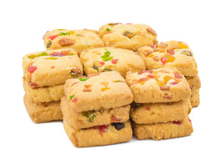 Heap of Delicious Tutti Frutti Cookies or Biscuits Also Know as Candied Fruits Cookies isolated on White Background