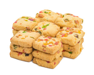 Heap of Delicious Tutti Frutti Cookies or Biscuits Also Know as Candied Fruits Cookies isolated on White Background