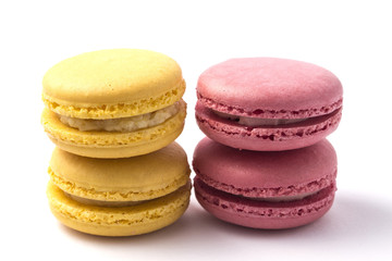 Sweet colorful macarons isolated on white background.