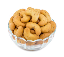 Salted Flavor Roasted Cashew Nut Snacks Served in Glass Bowl Also Know as in India Kaju Namkeen or Masala Kaju isolated on White Background
