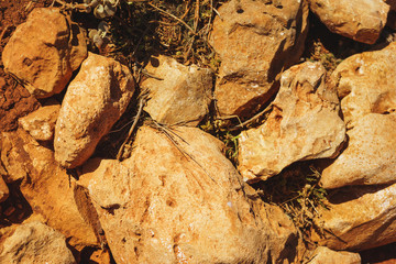Stones close-up and stony soil on the island of Crete, in the Balos beach area.