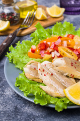 Fish fillet with raw vegetables