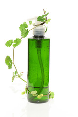 herbal tincture.Organic Botanical Serum.Natural organic extraction.  bottle with green herbal tincture on a white background. Homeopathy and alternative medicine. Natural Organic Cosmetic