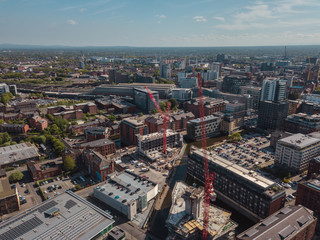 Obraz premium Aerial Drone Construction Work City Centre Building Apartments Crane High Rise 