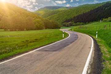 meadow with mountains and flares