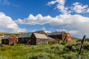 Ruined Buildings in the Californian Ghost Town of Bodie. Bodie is one of the best preserved Ghost Towns in America and was founded during the Californian Gold Rush. It was inhabited until the 1970s. 