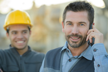 happy construction site workers