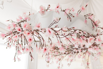 Photo of original wedding floral decoration hanging on the ceiling