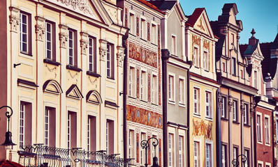 Vintage stylized old houses facades at Poznan Old Market Square, Poland.