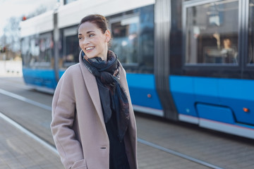 Attractive woman standing on an urban street