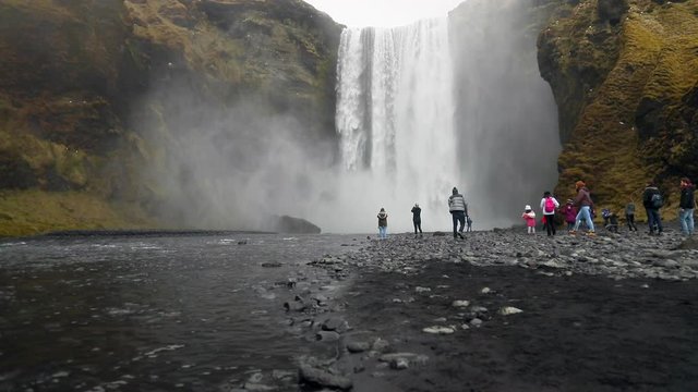 Wide: Tourists Enjoying the Site of the Waterfalls