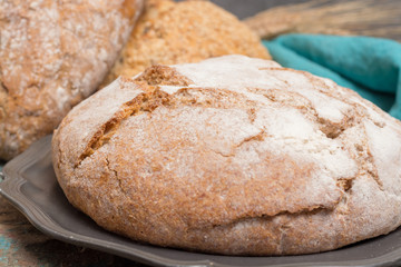 Farmers homemade organic wheat, barley and rye bread in assortment