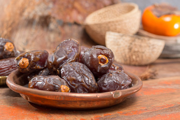 Traditional Middle East dessert, healthy food, big medjool dates fruits.