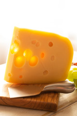 Dutch hard cheese Maasdam or Emmentaler, cheese with holes