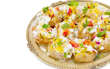 Indian Sweet And Spicy Chaat item Dahi Puri Also Called Dahi Batata Puri, Golgappe, Dahi Bhalle, Gol Gappa or Dahipuri Stuffed With Potato, Yogurt, Sev, Coriander, Chutney isolated on White Background
