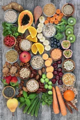 Wall murals Product Range Healthy high fibre super food with fruit, vegetables, pulses, nuts, seeds, cereals and grain with foods high in antioxidants, anthocyanins, omega 3 fatty acids and vitamins. Top view.