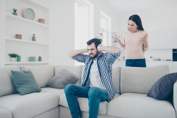 Portrait of aggressive discontent woman gesturing with hands making the brain yelling arguments to...
