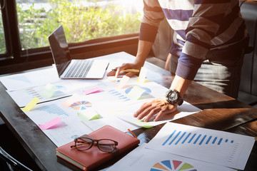 Business People in casual clothes meeting Design Ideas Concept for brainstorm new strategy of development. Planning Strategy Analysis Office Concept. Using marketing plans,sales reports.