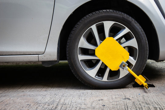 Wheel lock for anti-theft with the car on the road or concrete floor.
