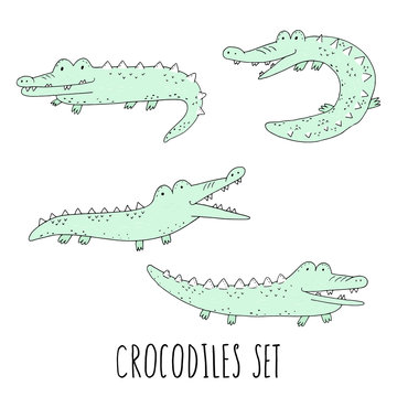 Vector set with fun crocodiles. Cartoon smiling alligators isolated on white background
