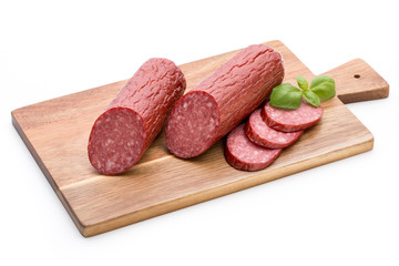 Salami smoked sausage, basil leaves on white background cutout.