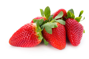 Fresh strawberries close up on white background.