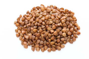 Buckwheat grains isolated on the white background.