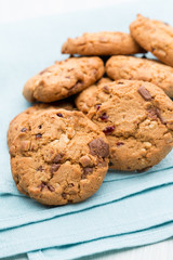 Chocolate oatmeal cookies on the  wooden background.