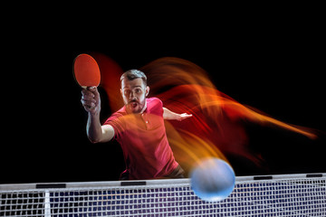 The table tennis player serving