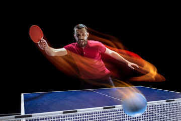 The table tennis player serving
