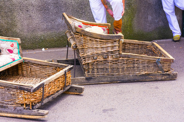 Wicker toboggan ride from Monte to Funchal, Madeira island, Portugal