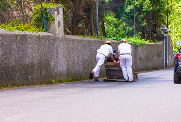 Wicker toboggan ride from Monte to Funchal, Madeira island, Portugal