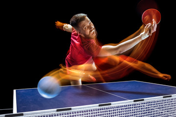 The table tennis player serving