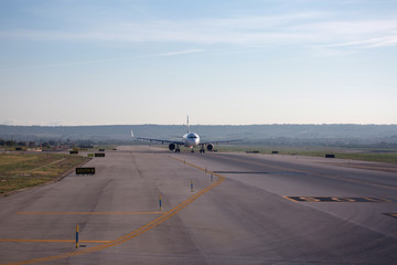 Fototapeta na wymiar airplane on the runway