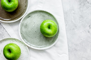 fresh organic green fruits with apples on stone background top v