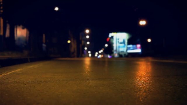 Night empty street on asphalt road slider footage